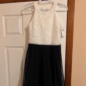 Beautiful white and navy dress. Brand new. Never worn.